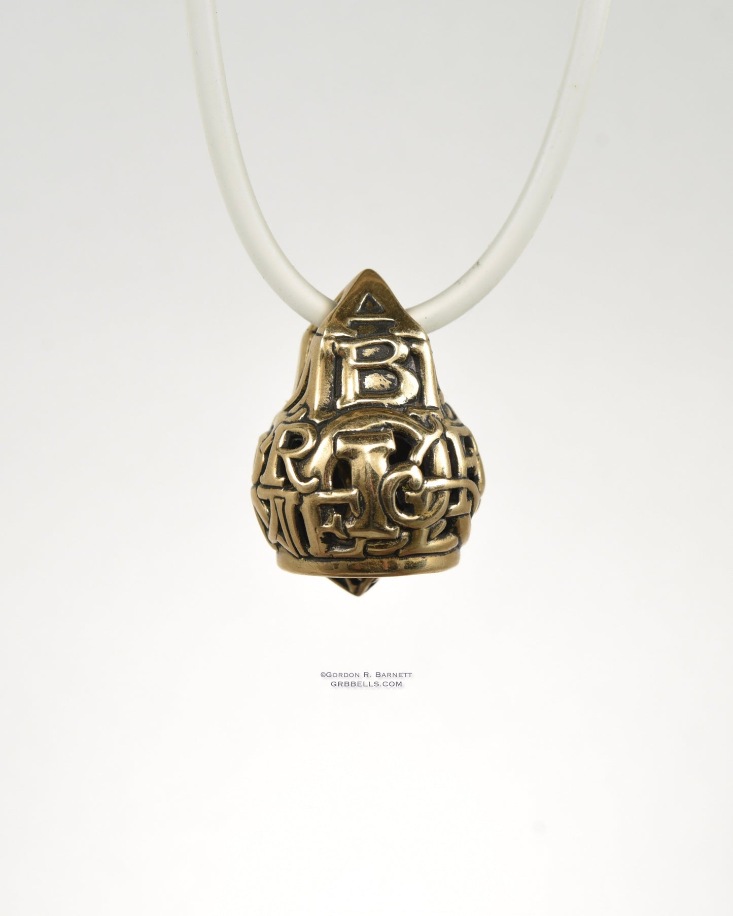 Bell Necklace by grbbells.com in bronze is 33 mm tall. front view This handmade pendant is made with lost wax casting, then polished and assembled in Washington state. suitable for teachers