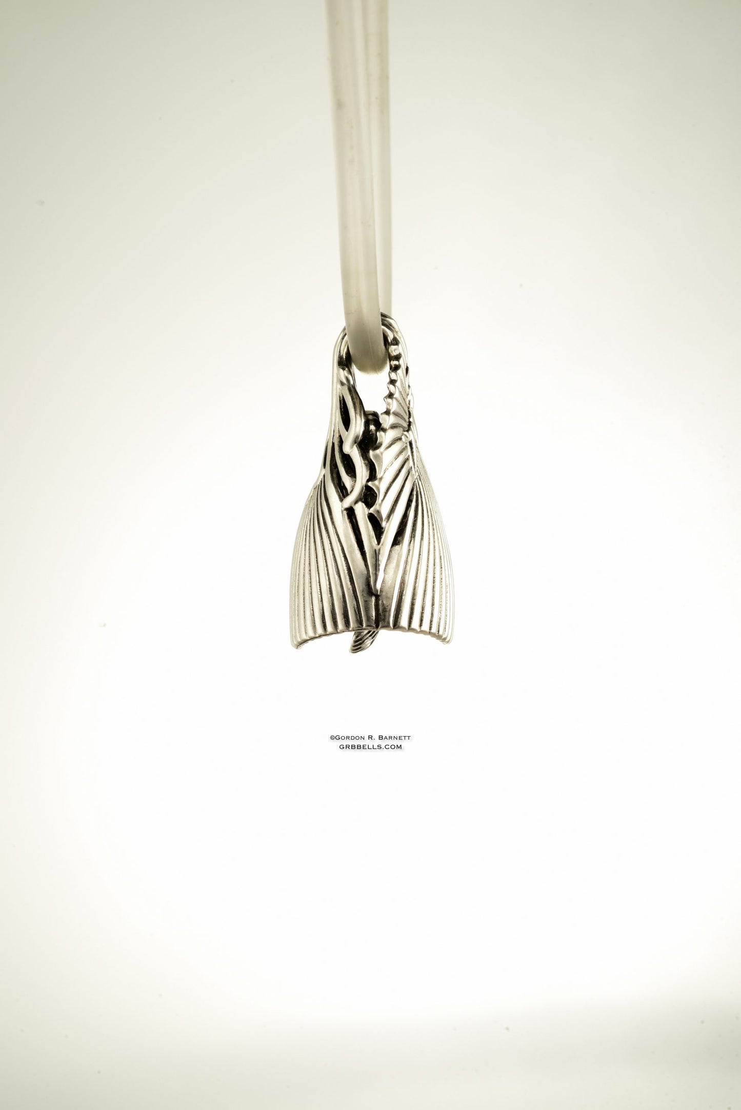 Angel Feather jewelry bell necklace in sterling silver, side view