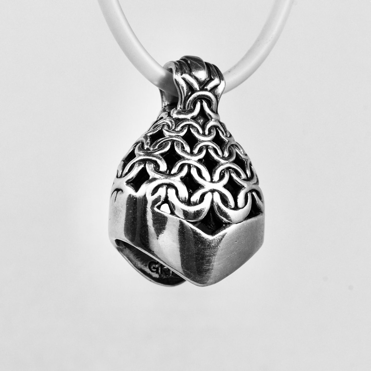 CHAIN MAIL jewelry bell necklace back three-quarter view in bronze is a handmade pendant in sterling silver is made with lost wax casting, then polished and assembled in Washington state perfect gift for mesh strength