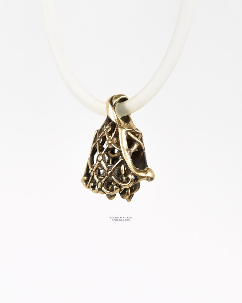 chantilly jewelry bell necklace in bronze is 22 mm tall (three-quarter view front right) is handmade pendant is made with lost wax casting, then polished and assembled in Washington state perfect gift for lace & bride