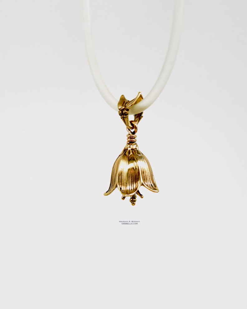chocolate lily bell necklace in bronze is 30 mm tall. (three-quarter view front right) his handmade pendant is made with lost wax casting, then polished and assembled in Washington state. suitable for botanist gardener