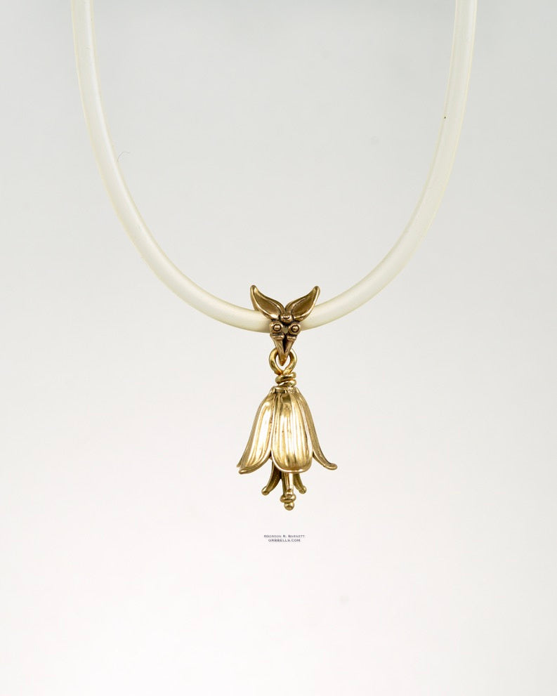 chocolate lily bell necklace in bronze is 30 mm tall. (front view) his handmade pendant is made with lost wax casting, then polished and assembled in Washington state. suitable for botanist gardener