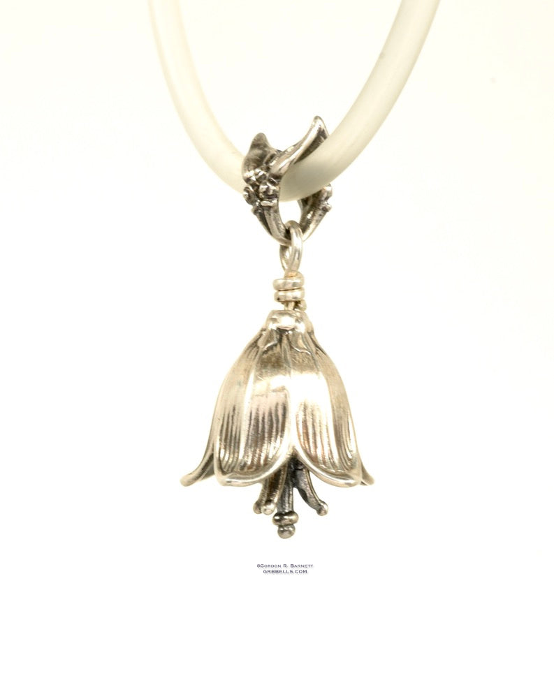 small chocolate lily bell necklace in sterling silver is 30 mm tall. (front three-quarterview) his handmade pendant is made with lost wax casting, then polished and assembled in Washington state. suitable for botanist gardener
