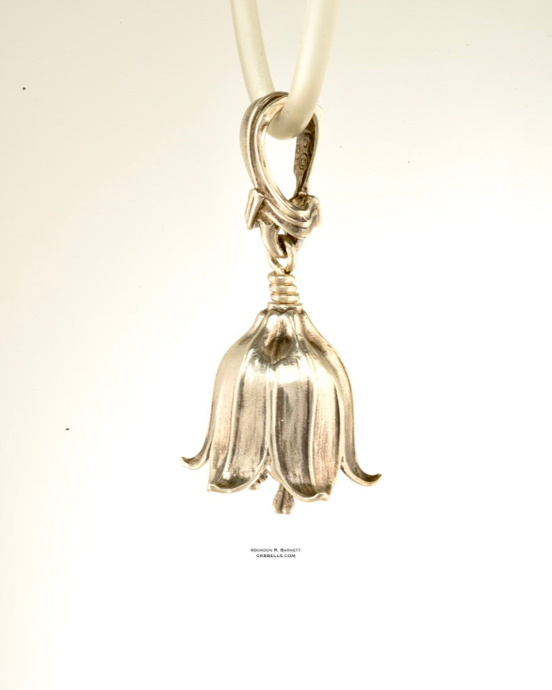chocolate lily bell necklace in sterling silver is 47 mm tall. (right side view) his handmade pendant is made with lost wax casting, then polished and assembled in Washington state. suitable for botanist gardener