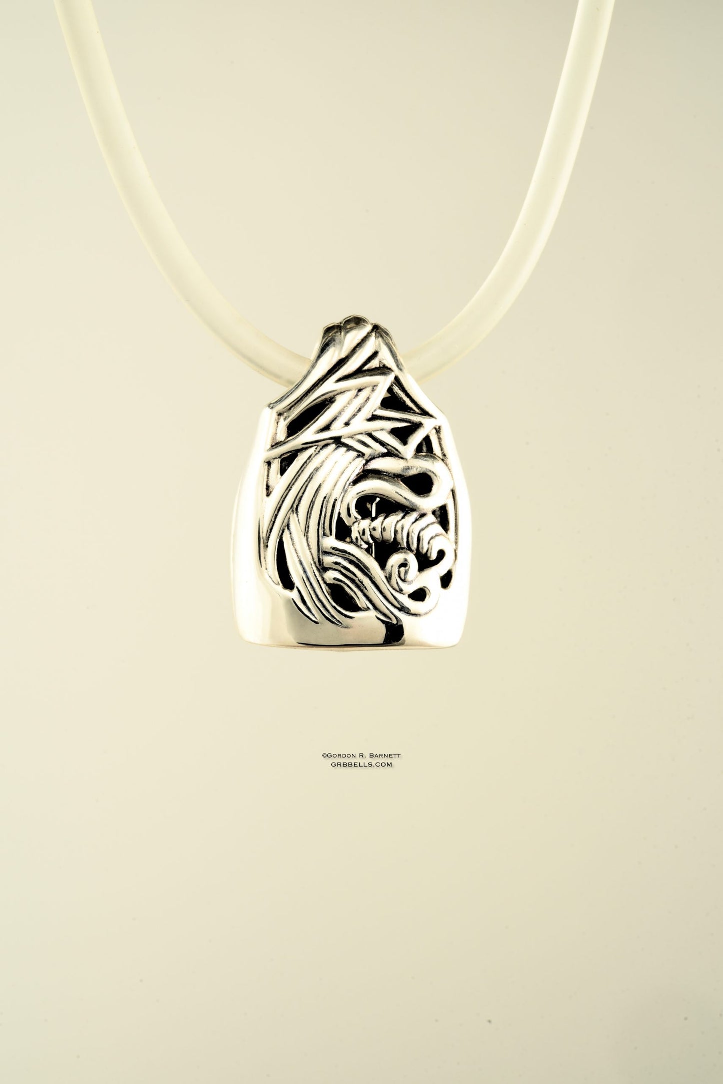 Necklace in Sterling silver is 28 mm tall (front view). This handmade pendant is made with lost wax casting, then polished and assembled in Washington state. Suitable for clarity inside storm