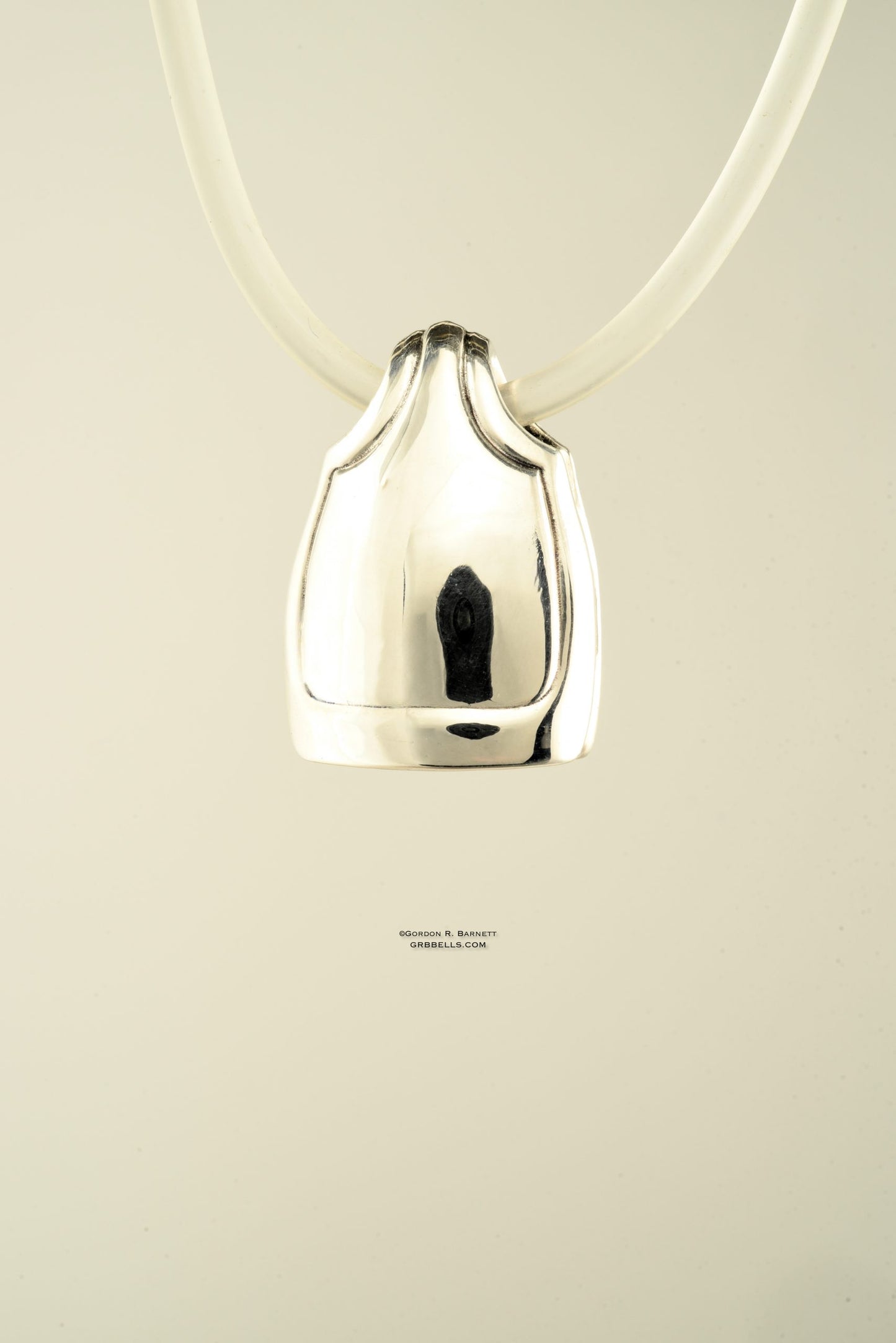 Necklace in Sterling silver is 28 mm tall (back view). This handmade pendant is made with lost wax casting, then polished and assembled in Washington state. Suitable for clarity inside storm