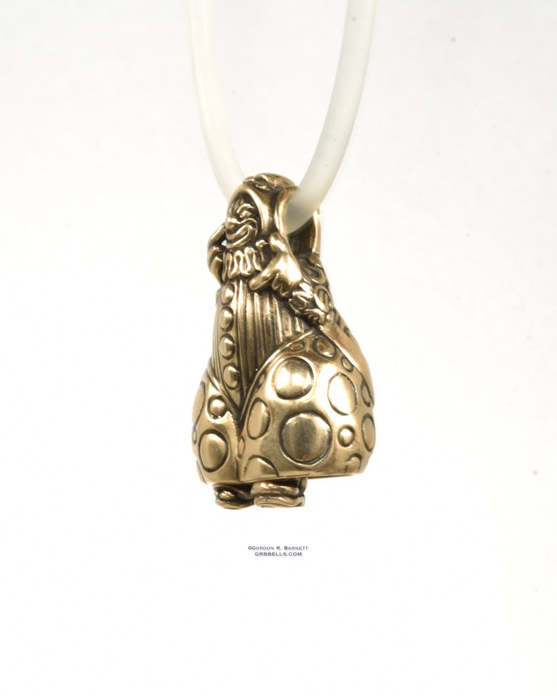 Bell Necklace in bronze is 36 mm tall. (three-quarter view front)This handmade pendant is made with lost wax casting, then polished and assembled in Washington state. suitable for fun & clowning