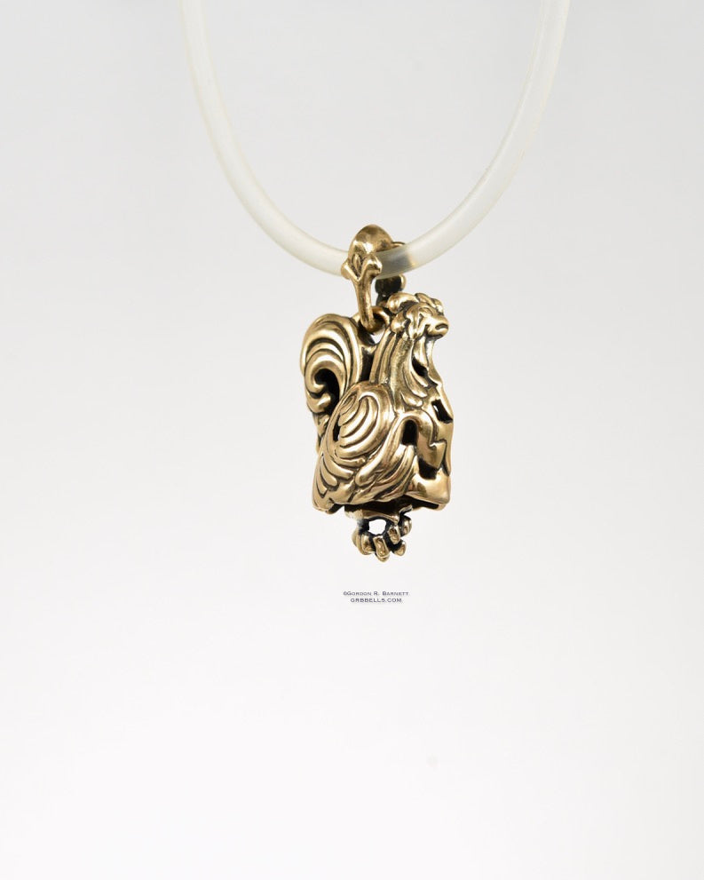 Coq/rooster jewelry bell necklace back three-quarter view is a handmade pendant in bronze is made with lost wax casting, then polished and assembled in Washington state perfect gift for rooster interest