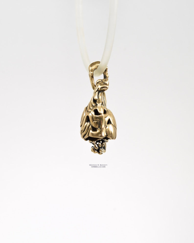 Coq/rooster jewelry bell necklace right side view is a handmade pendant in sterling silver is made with lost wax casting, then polished and assembled in Washington state perfect gift for rooster interest
