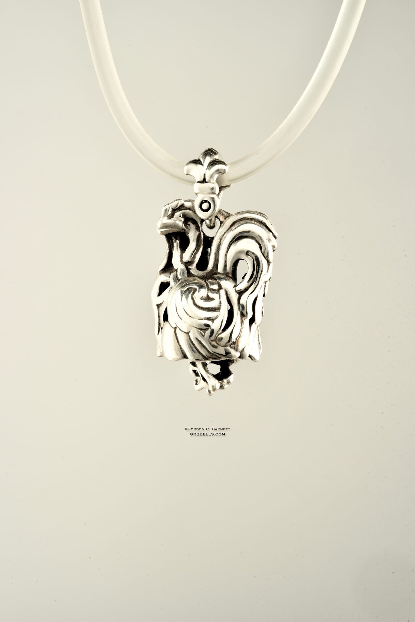 Coq rooster jewelry bell necklace front view is a handmade pendant in sterling silver is made with lost wax casting, then polished and assembled in Washington state perfect gift for rooster interest