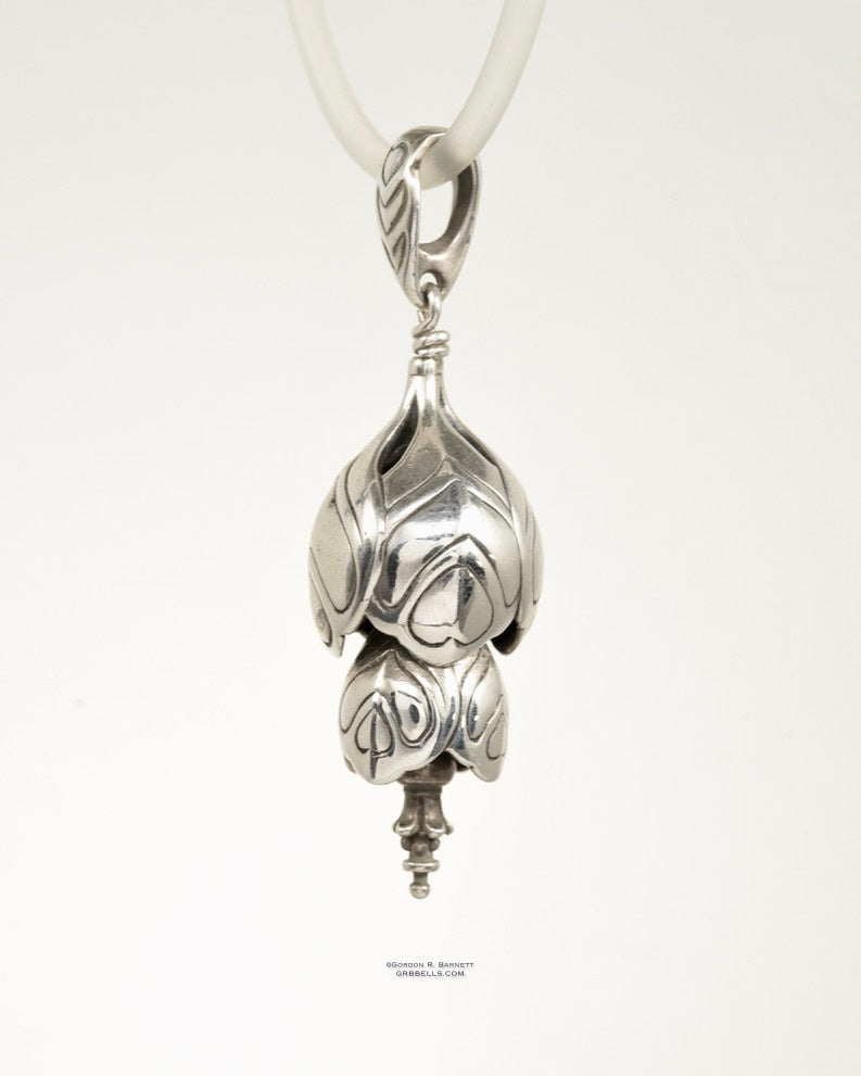 Bell Necklace in sterling silver 54 mm tall, (right three-quarter view) This handmade pendant is made with lost wax casting, then polished and assembled in Washington state. suitable for gardeners