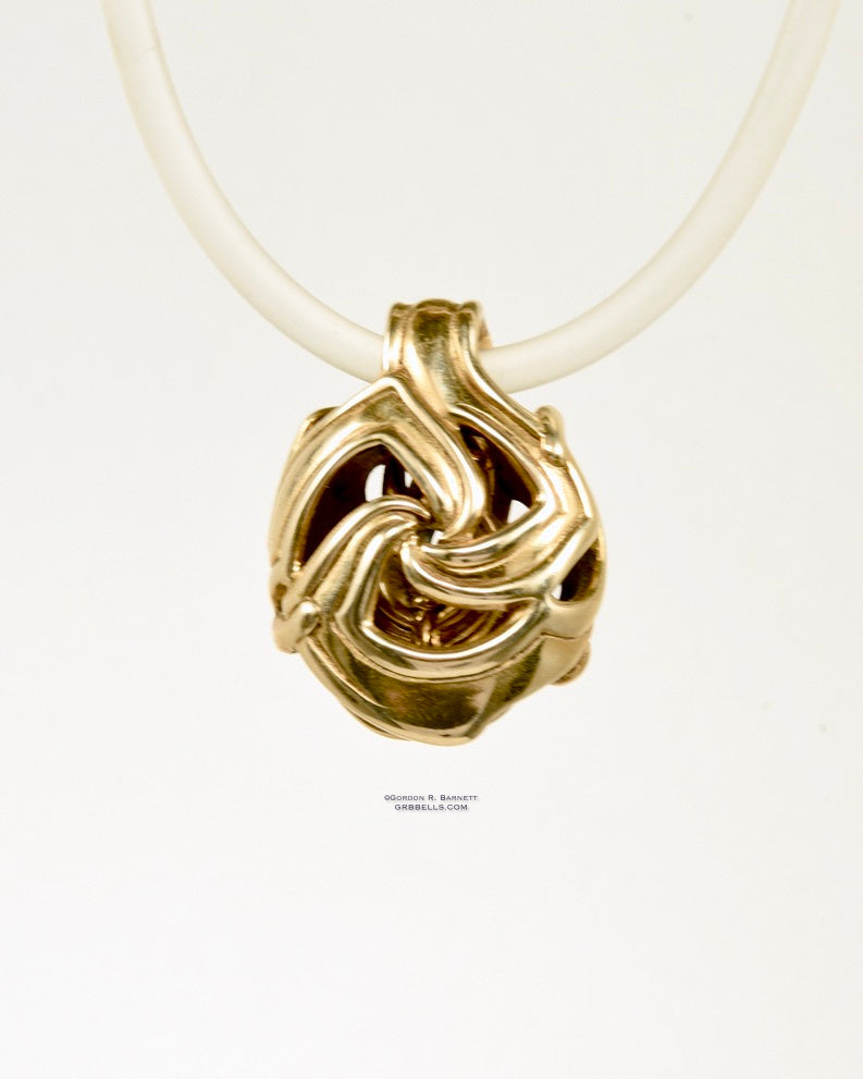 CELTIC TRISKELE jewelry bell necklace back view in bronze is a handmade pendant in bronze is made with lost wax casting, then polished and assembled in Washington state perfect gift for celtic symbol