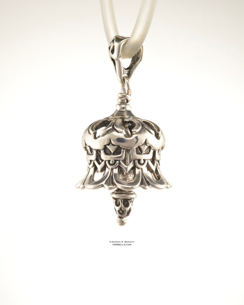 Bell Necklace in sterling silver is 36 mm tall. (side view) This handmade pendant is made with lost wax casting, then polished and assembled in Washington state. suitable for bowing