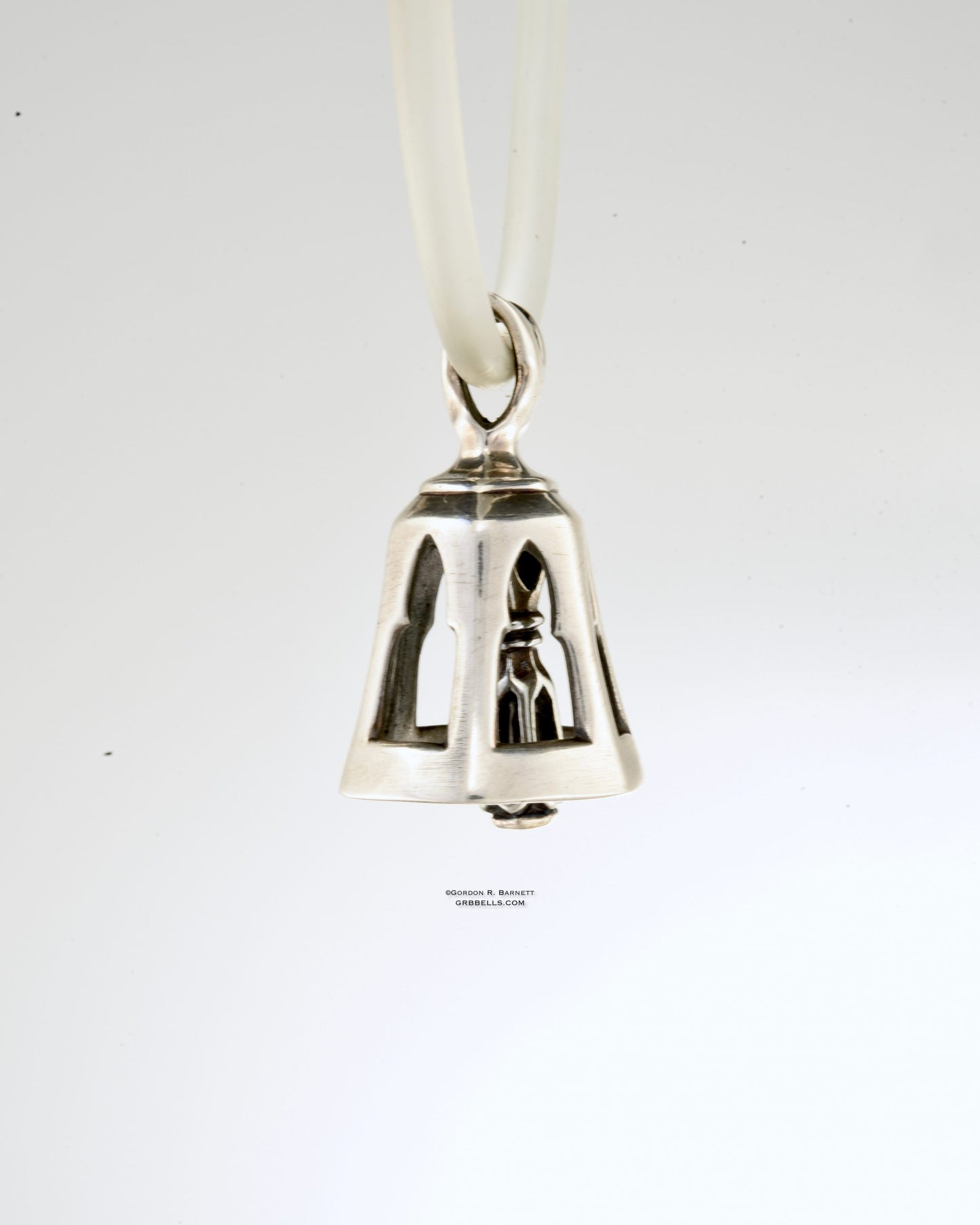 Bell Necklace in bronzeis 30 mm tall, (three=quarter view) This handmade pendant is made with lost wax casting, then polished and assembled in Washington state. suitable for arches