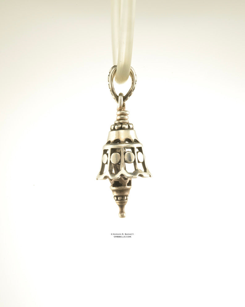 Bell Necklace in bronzeis 30 mm tall, (side view) This handmade pendant is made with lost wax casting, then polished and assembled in Washington state. suitable for quiet voices