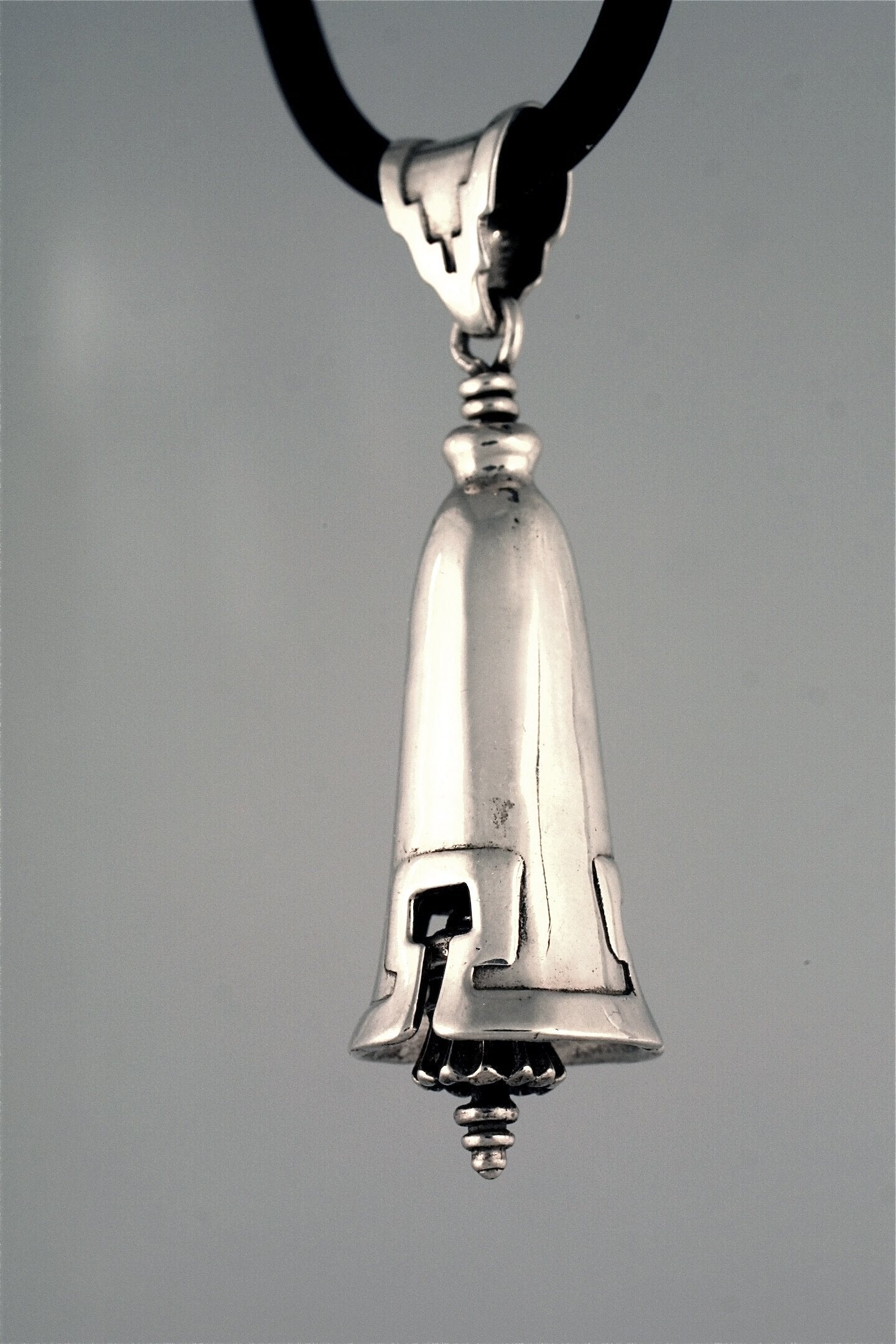 Bell Necklace in Sterling silver is 31.5 mm tall This handmade pendant is made with lost wax casting, then polished and assembled in Washington state. front view) mm tall. This handmade pendant is made with lost wax casting, then polished and assembled in Washington state. suitable for deco tassle