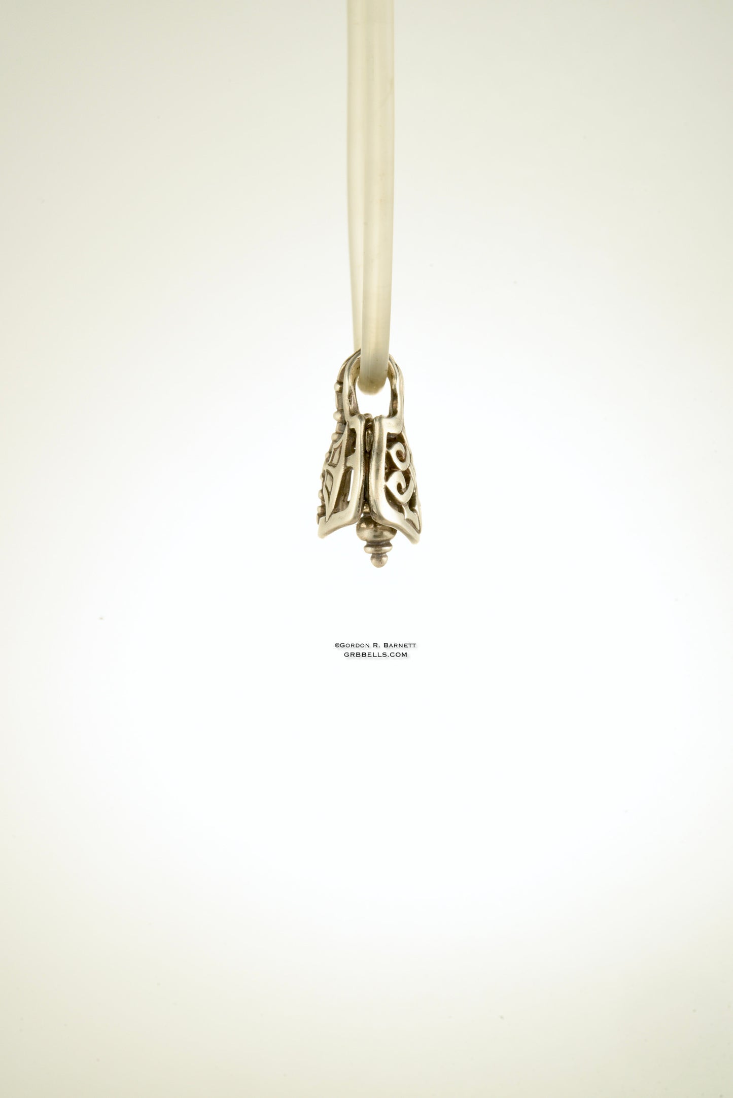 CELTIC LABRYS jewelry bell necklace side view in sterling silver is a handmade pendant is made with lost wax casting, then polished and assembled in Washington state perfect gift for butterfy blade