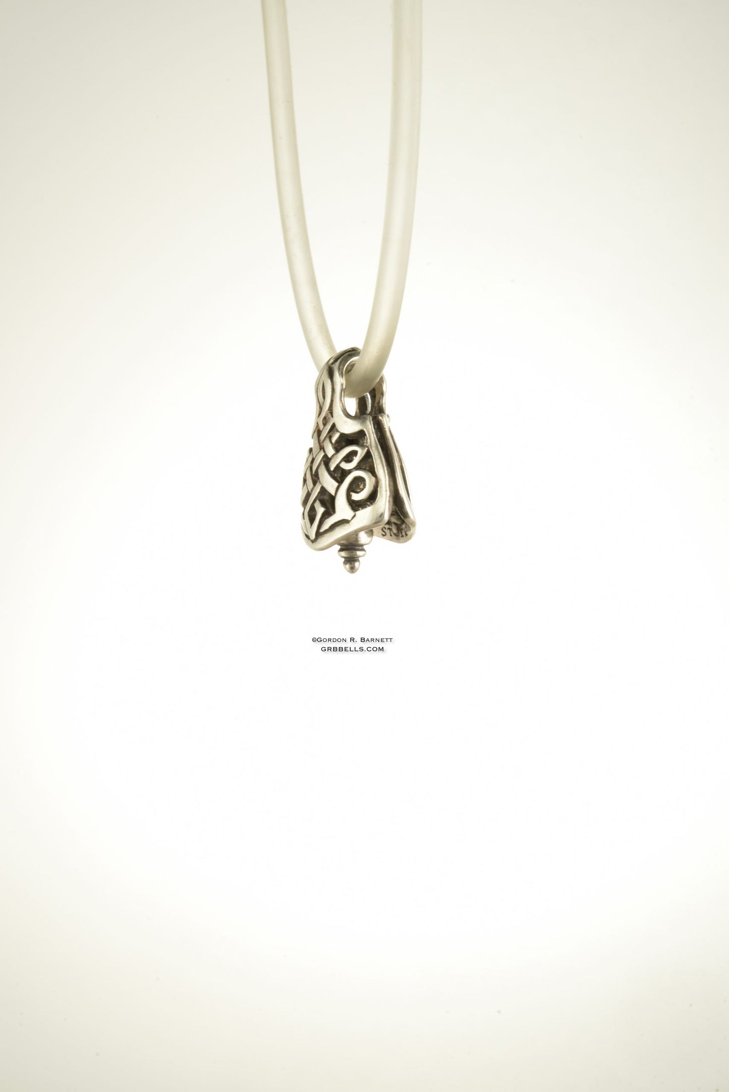 CELTIC LABRYS jewelry bell necklace three-quarter view in sterling silver is a handmade pendant is made with lost wax casting, then polished and assembled in Washington state perfect gift for butterfy blade