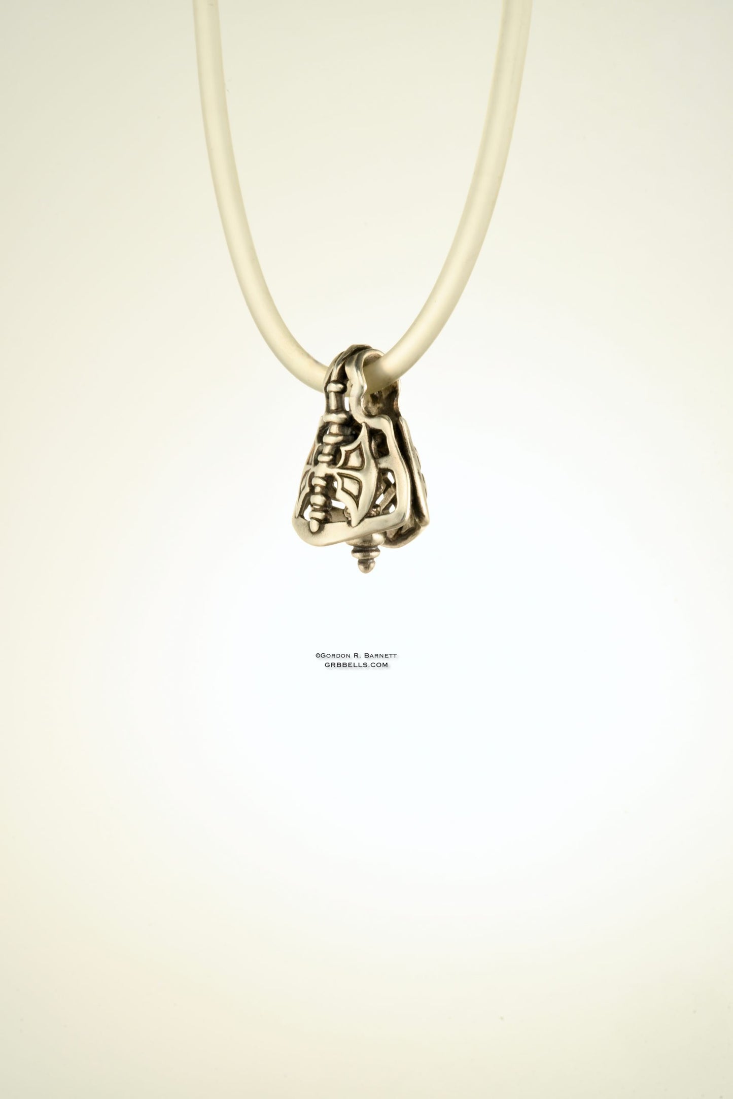 CELTIC LABRYS jewelry bell necklace side view in sterling silver is a handmade pendant is made with lost wax casting, then polished and assembled in Washington state perfect gift for butterfy blade