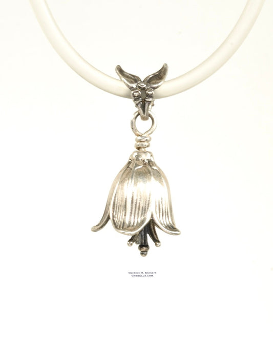 small chocolate lily bell necklace in sterling silver is 30 mm tall. (front view) this handmade pendant is made with lost wax casting, then polished and assembled in Washington state. suitable for botanist gardener 
